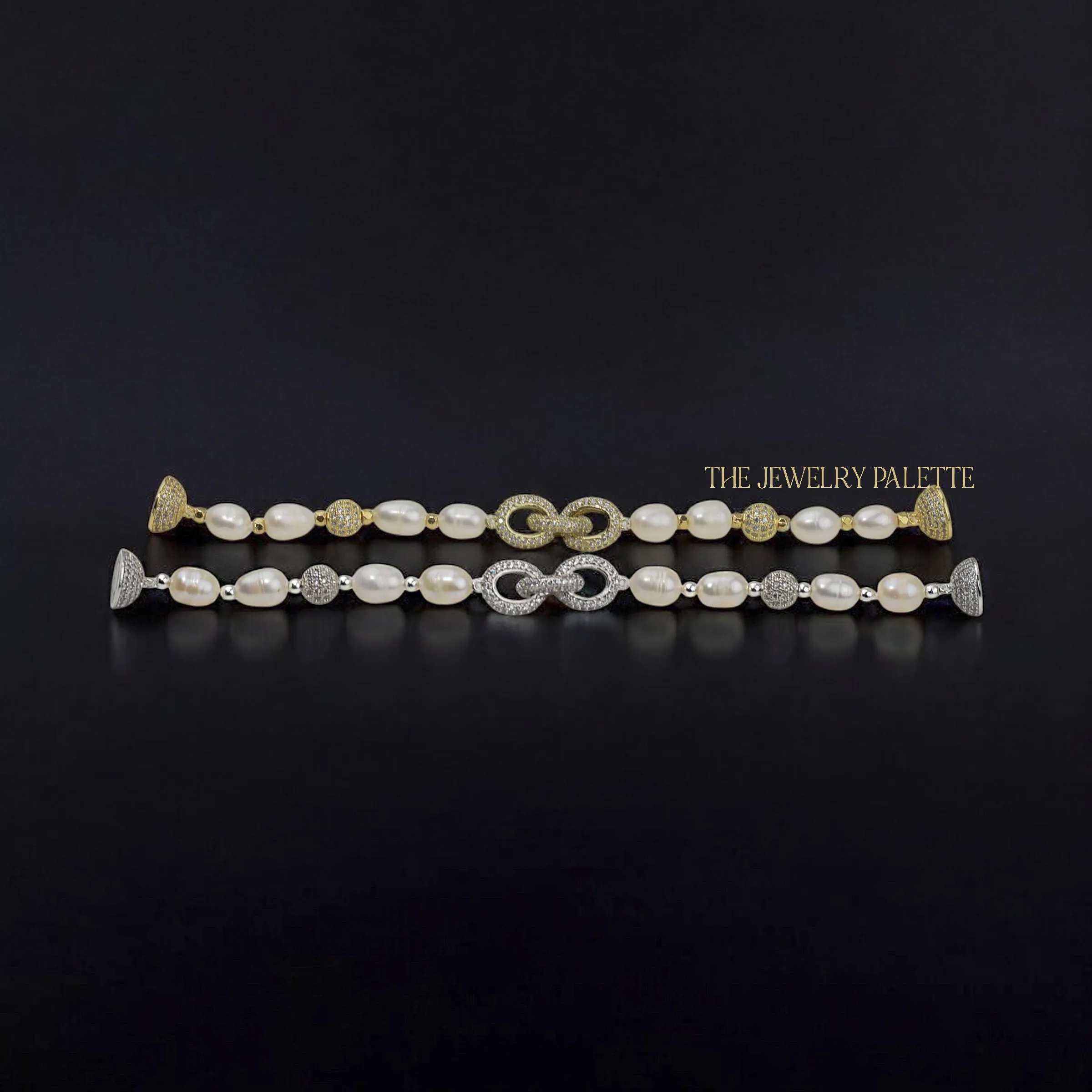 Adele white freshwater pearl bracelet with interlocking gold centerpiece