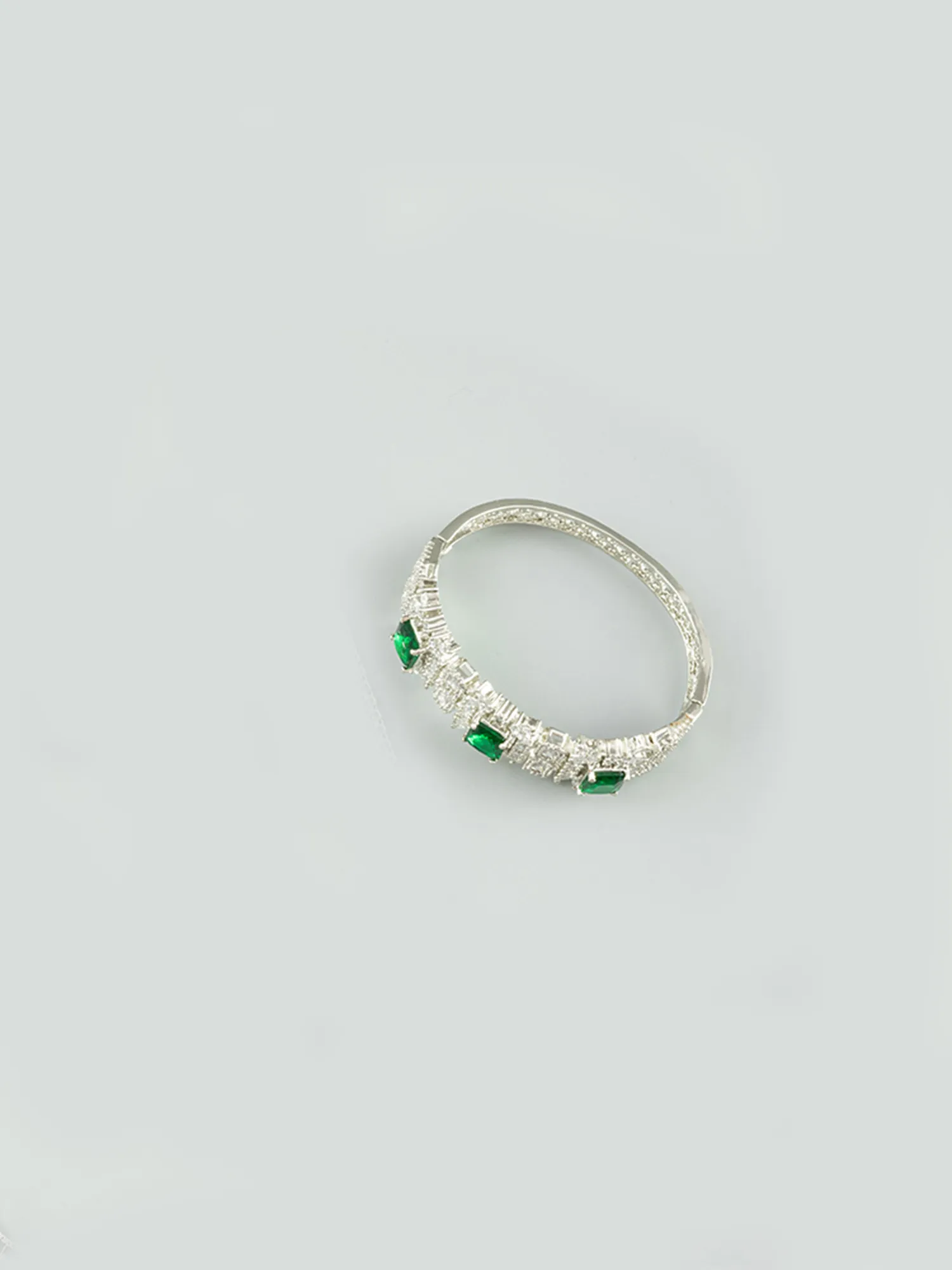 Silver-Plated American Diamond Bracelet with Green Zircon Stones
