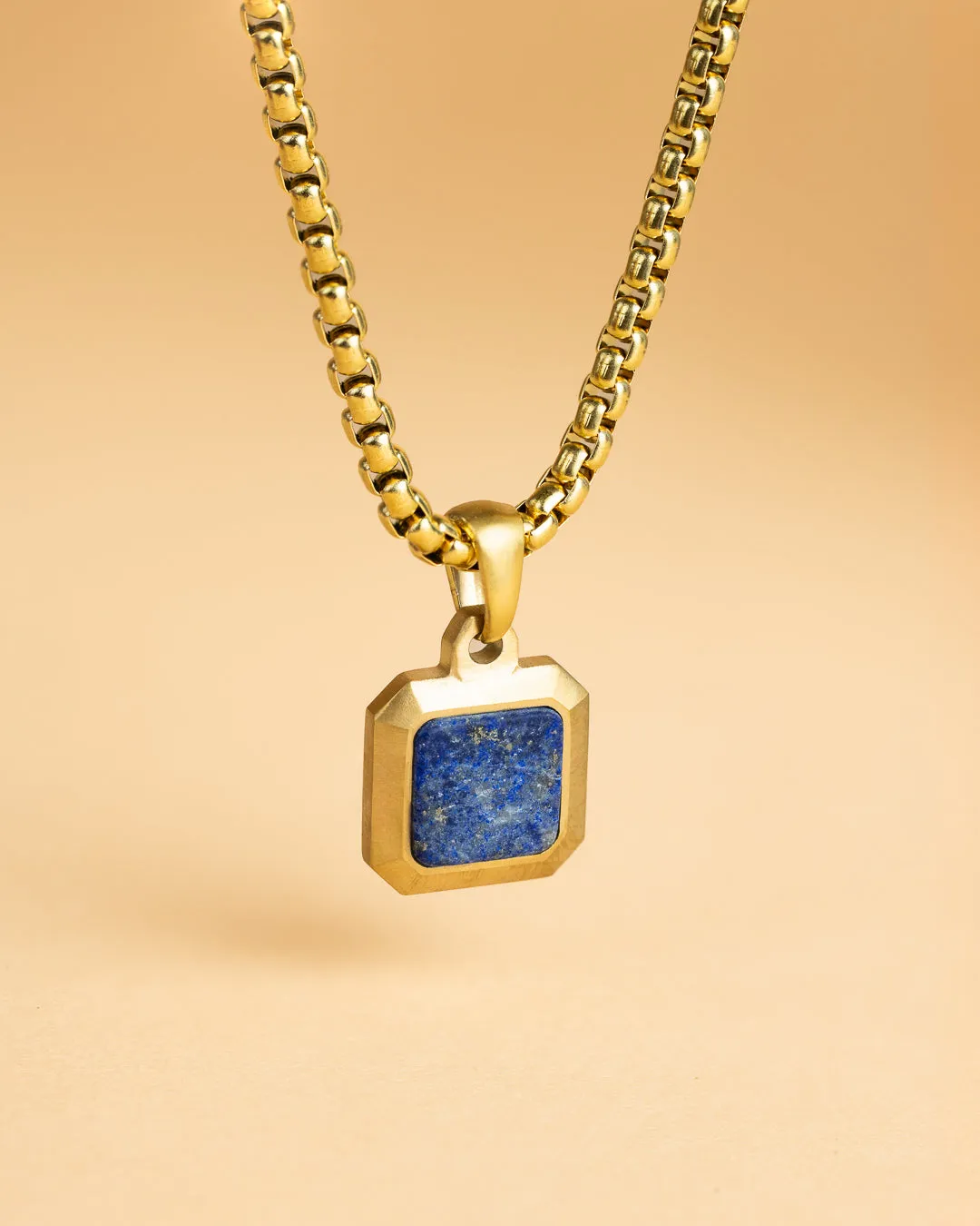 Titanium/steel necklace with an 18kt gold finish and Lapis Lazuli stone