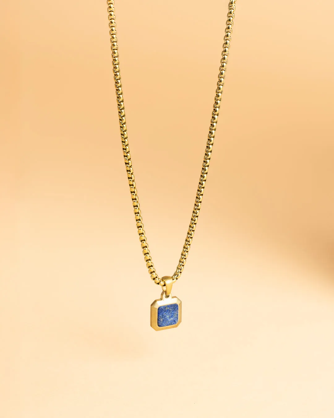 Titanium/steel necklace with an 18kt gold finish and Lapis Lazuli stone